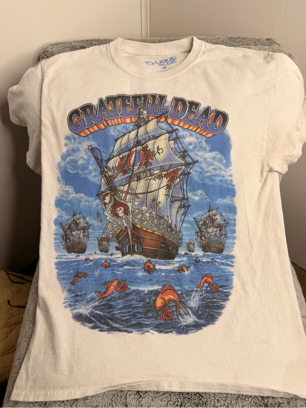 Liquid Blue White Tee with Blue and Black Graphic
